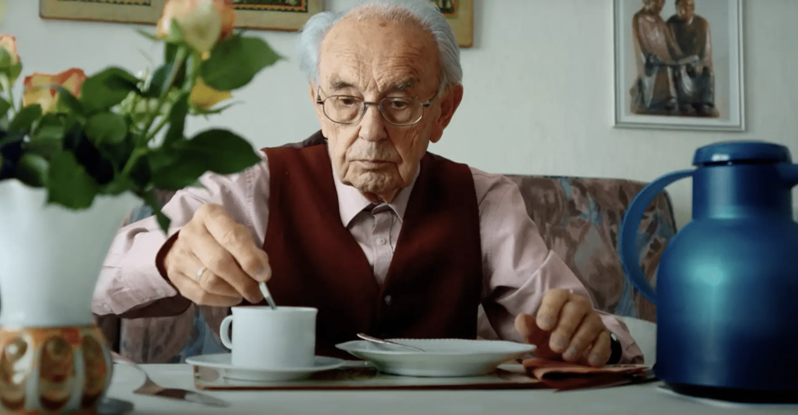 Old man taking tea
